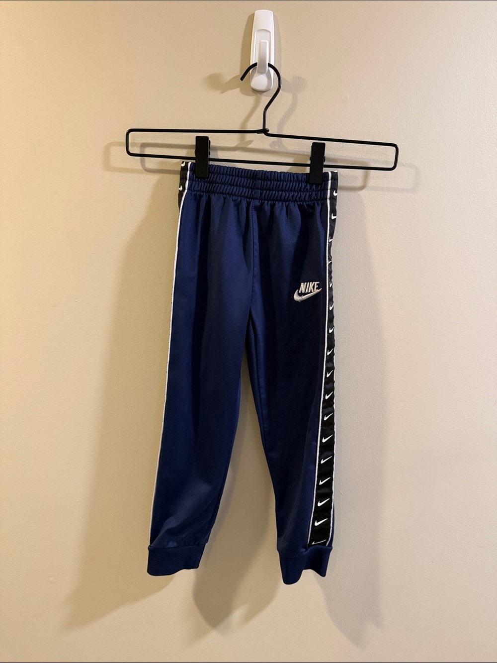 Nike Kids Navy Blue Joggers with Black Swoosh Tape